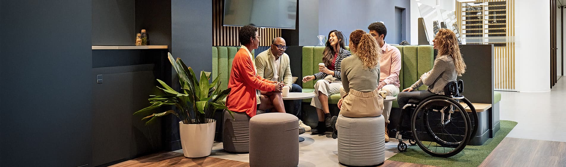 Business team meeting in modern office sitting area